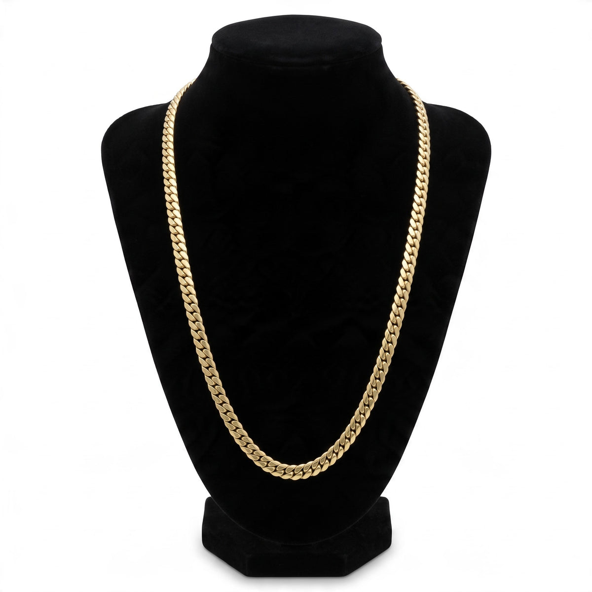 Cadena tipo Cartier de El Rey Joyero en oro laminado de 18k con eslabones cubanos clásicos sobre busto expositor negro.