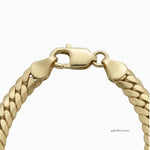 Pulsera estilo barbado cubano de El Rey Joyero en oro laminado 18k con eslabones de 6mm y broche de perico