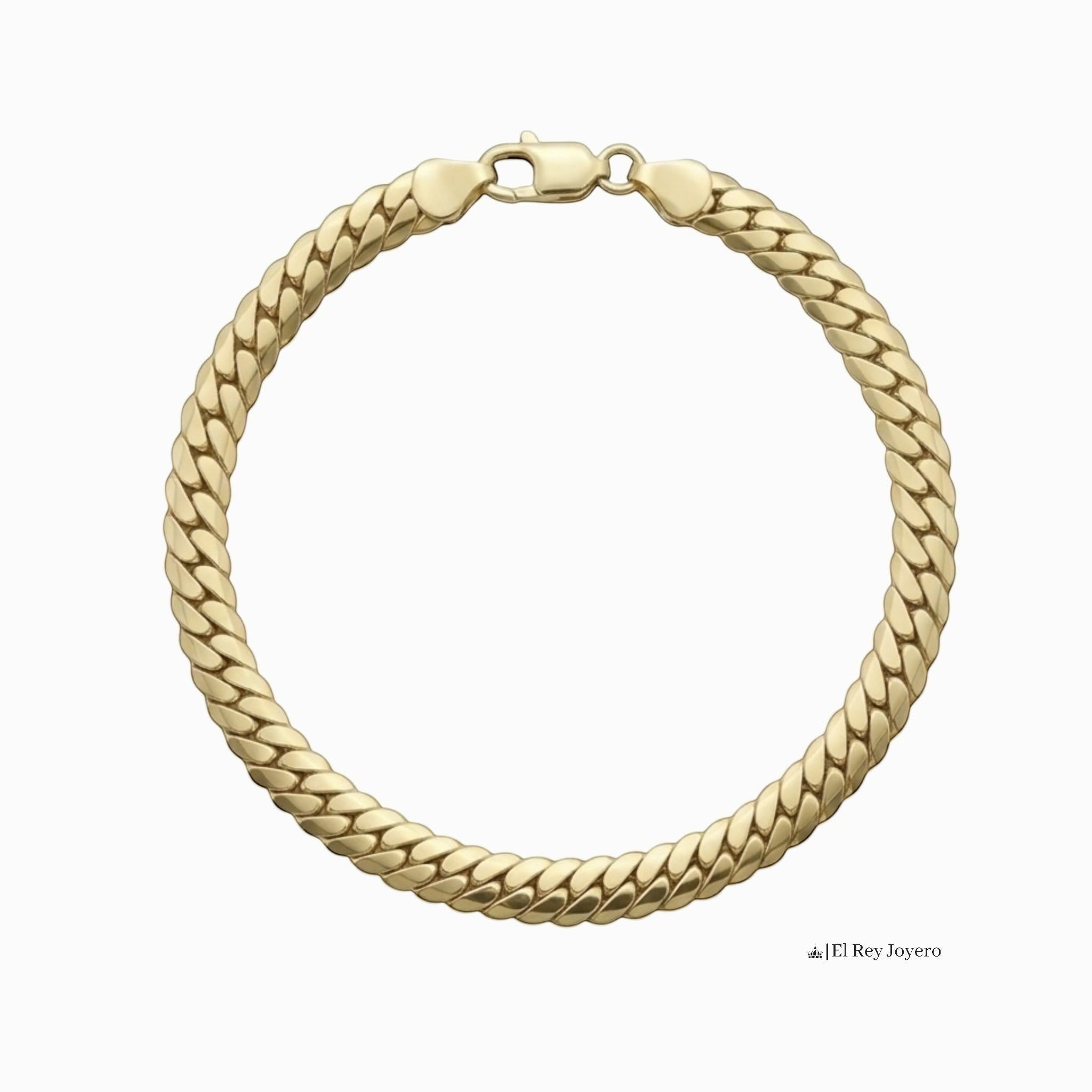 Pulsera estilo cubano de El Rey Joyero en oro laminado 18k con eslabones curb de 6mm y broche de perico.