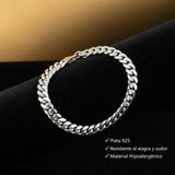 Pulsera estilo cubano de 8mm en plata .925 sólida de El Rey Joyero, diseño italiano brillante sobre fondo negro.