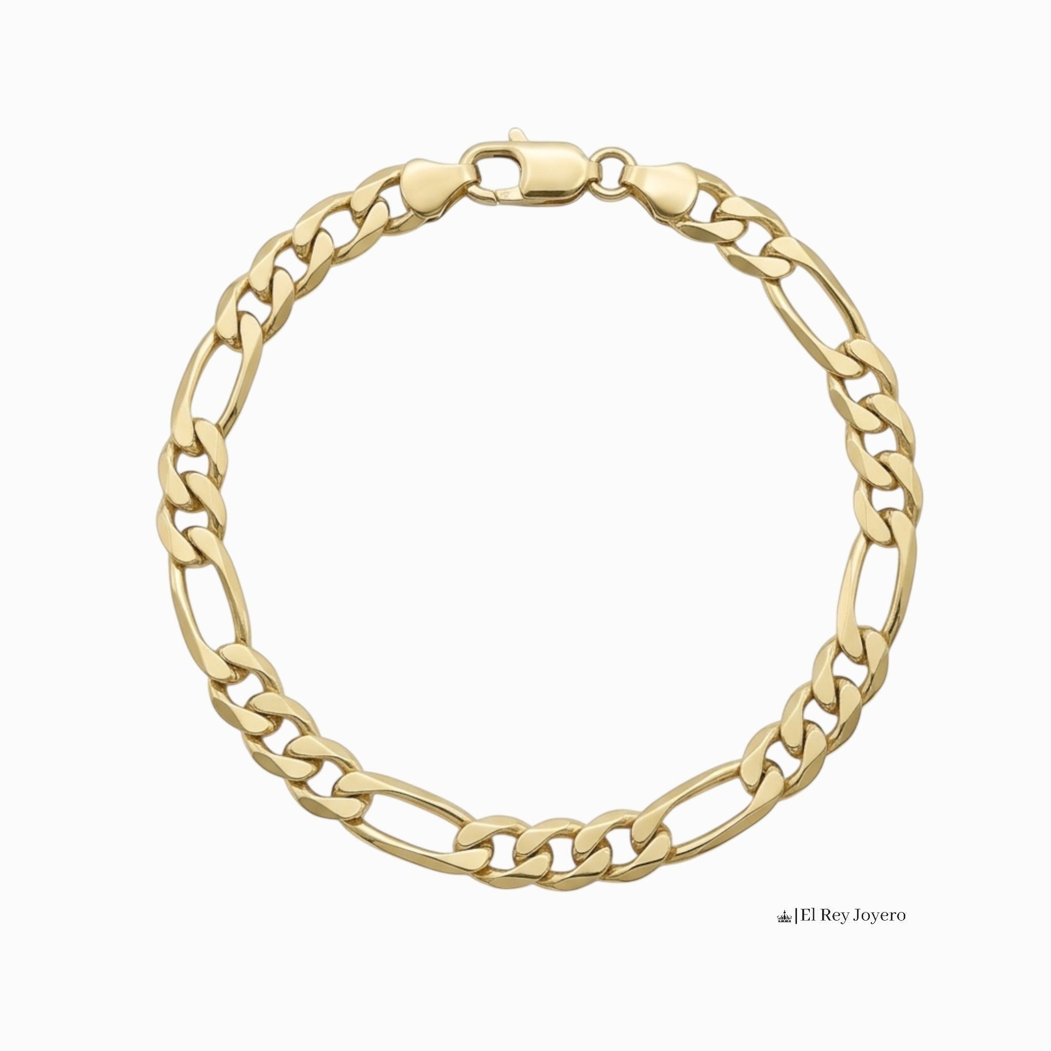 Pulsera El Rey Joyero estilo Figaro de 7mm en oro laminado 18k con eslabones 3x1 y broche de perico.