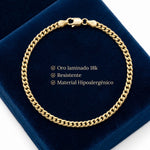 Pulsera tipo Mónaco de El Rey Joyero en oro laminado 18k de 5mm sobre estuche de terciopelo azul