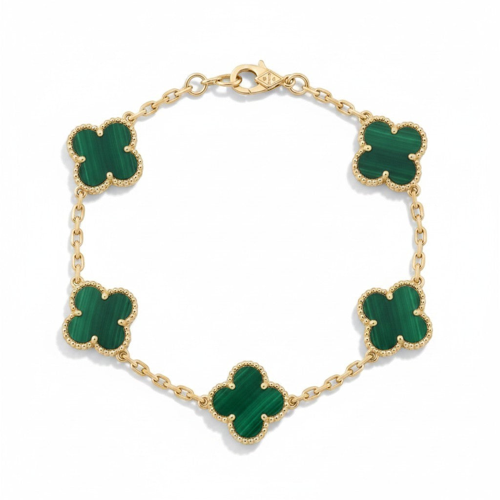 Pulsera El Rey Joyero estilo trébol con piedras verdes y eslabones de oro laminado de 18k