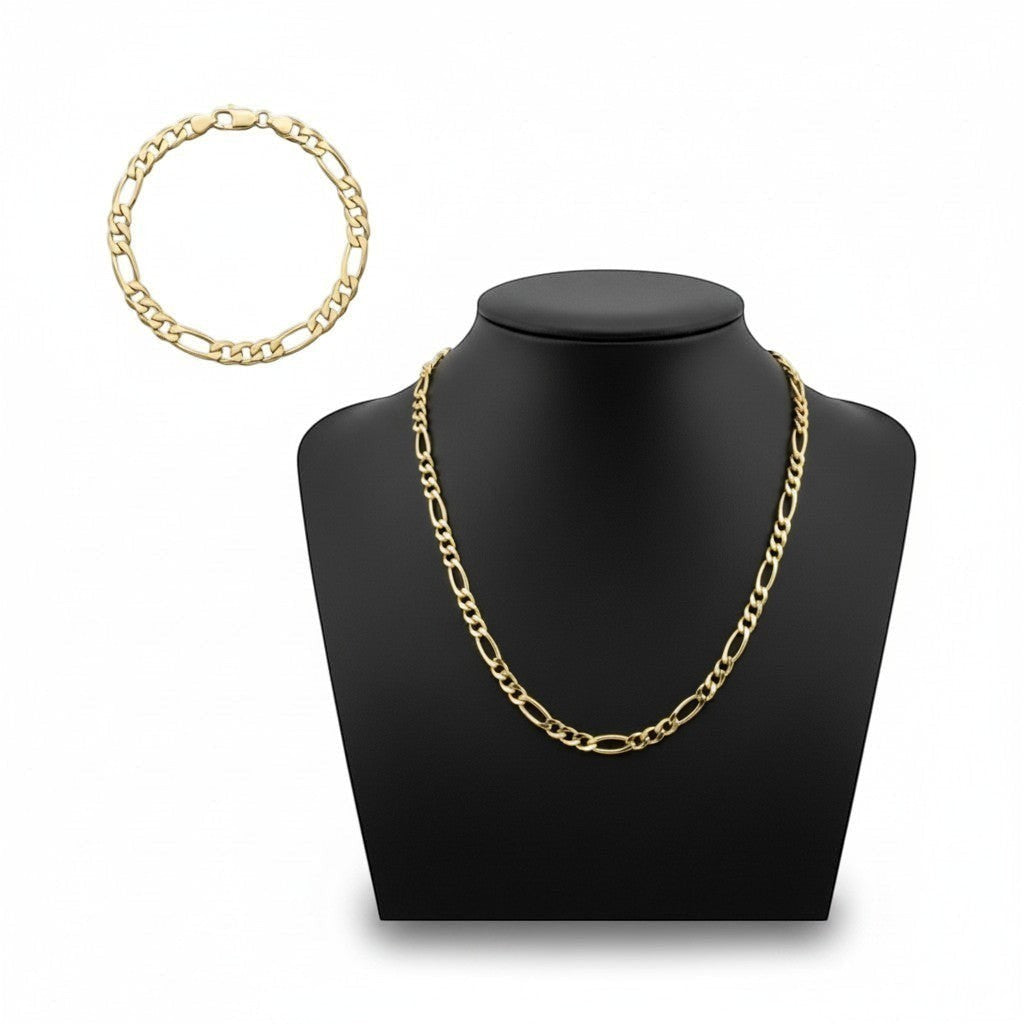 Set de cadena y pulsera Cartier de El Rey Joyero en baño de oro 18k con eslabones estilo figaro sobre maniquí negro
